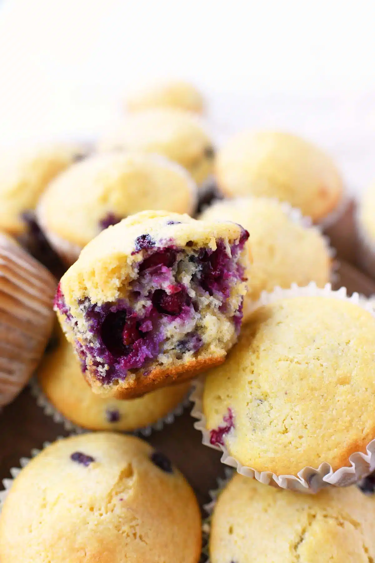 Inside of a fluffy, blueberry-filled corn muffin.