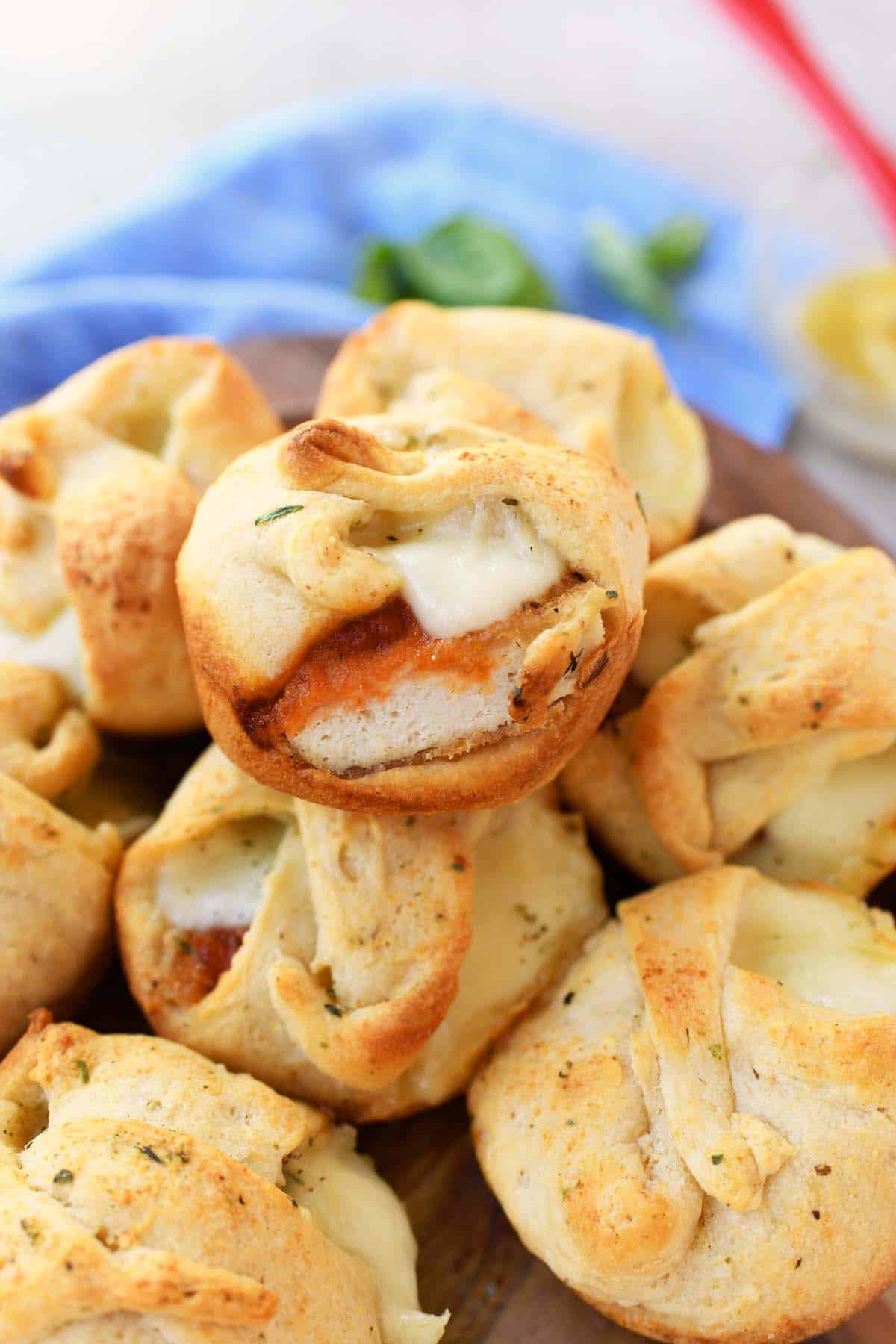 Crescents loaded with sauce and cheese.