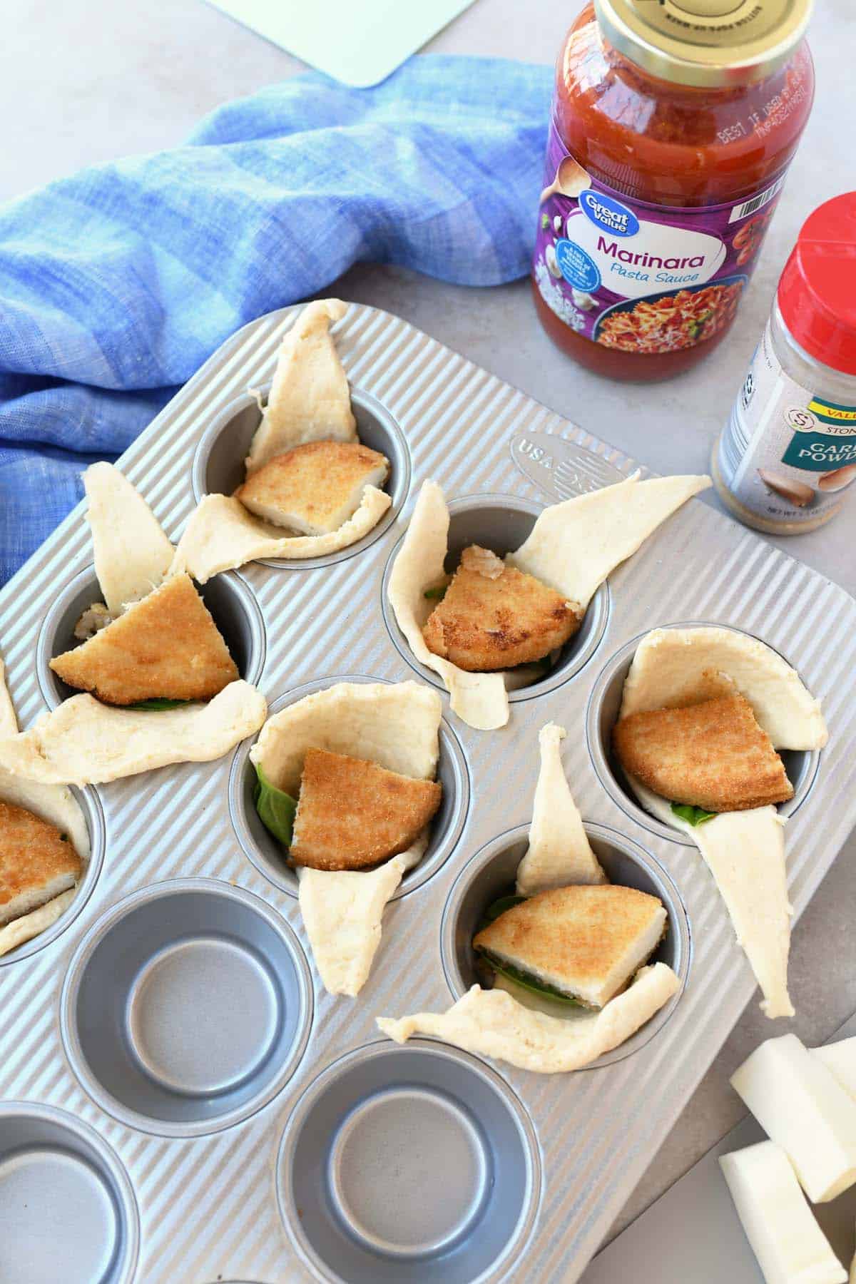 Crescents with a piece of breaded chicken inside. 