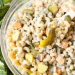 An up close shot of dill pickle pasta salad in a bowl.