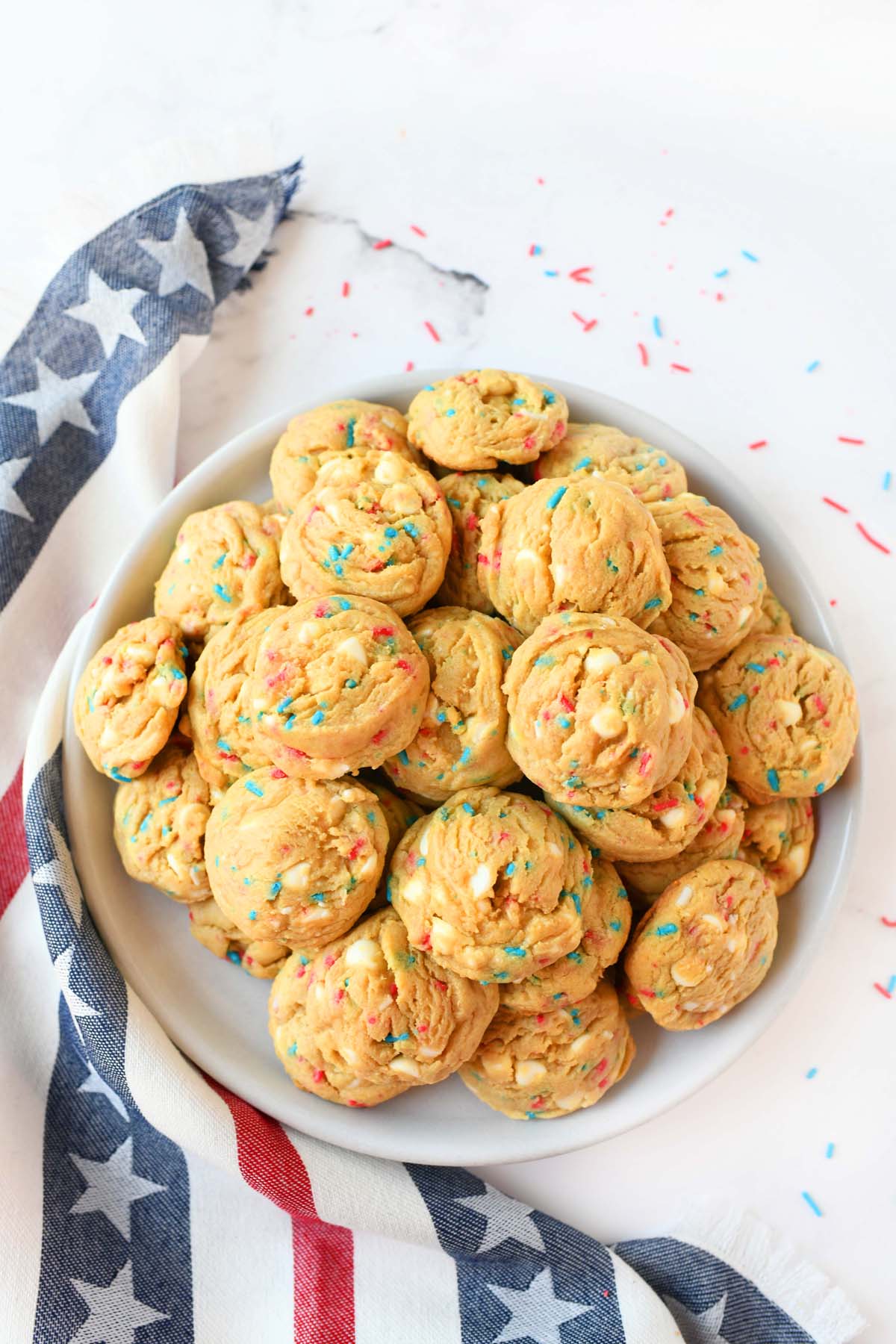 A plate of golden brown patriotic pudding cookies. 