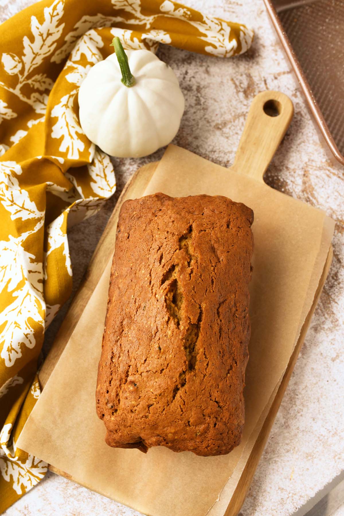 A golden-brown baked zucchini loaf.
