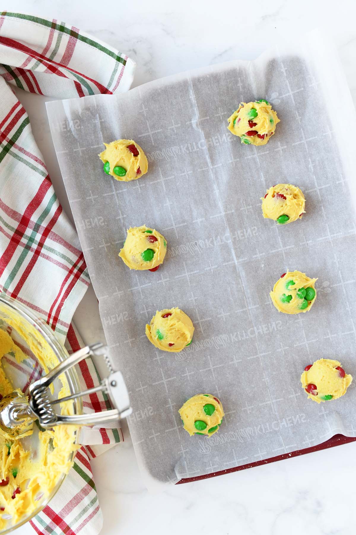 Cake mix cookie dough balls on a baking sheet.