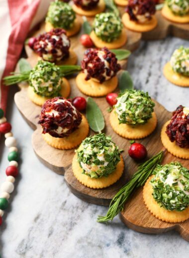 A shot of red and green mini cheeseballs up close.