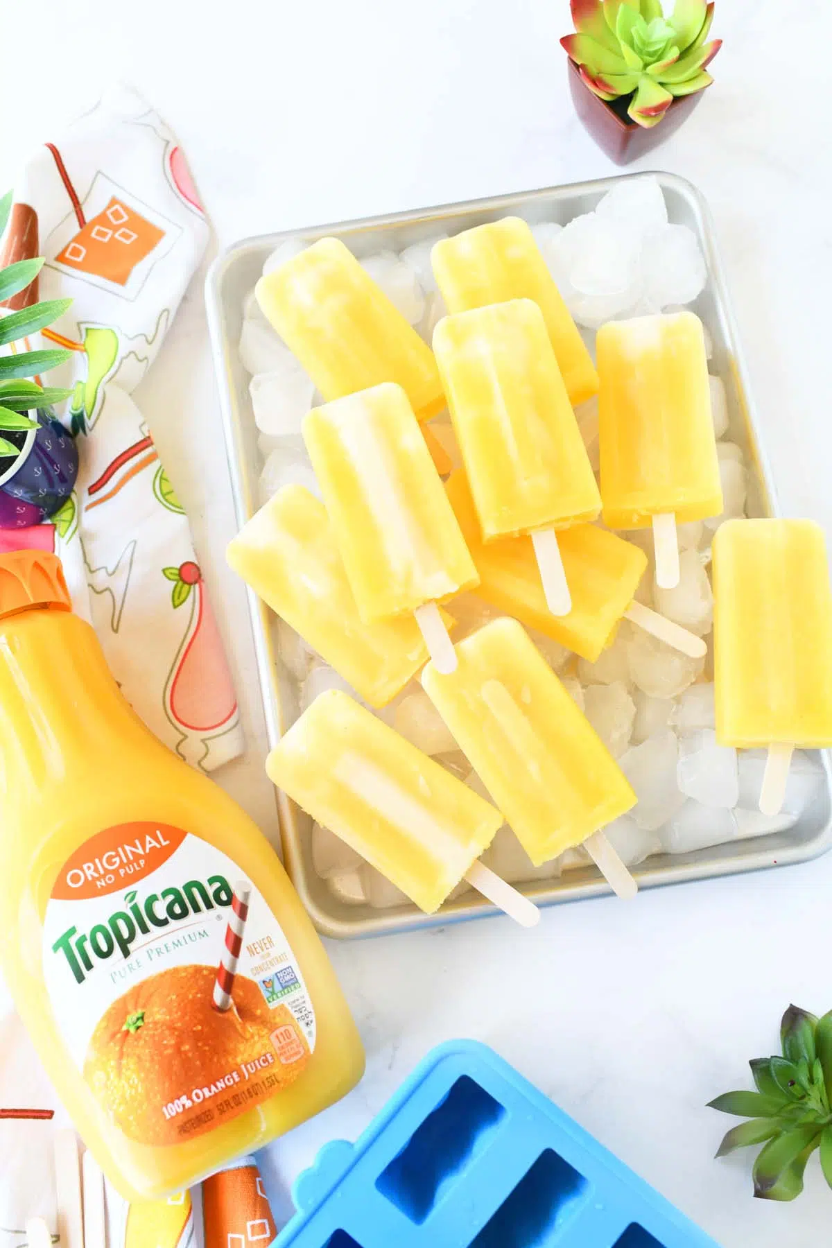Frozen Pops on a tray with ice.