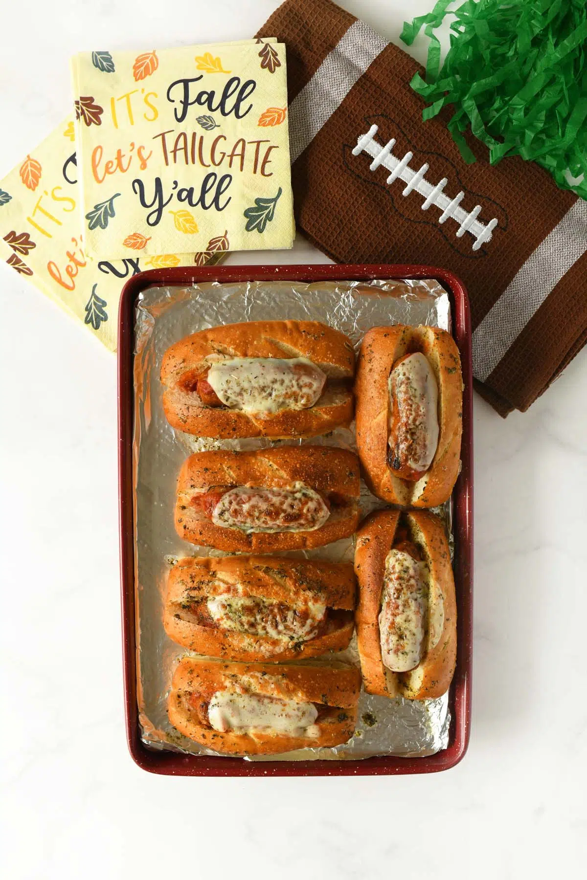 Broiled sausage subs with provolone.