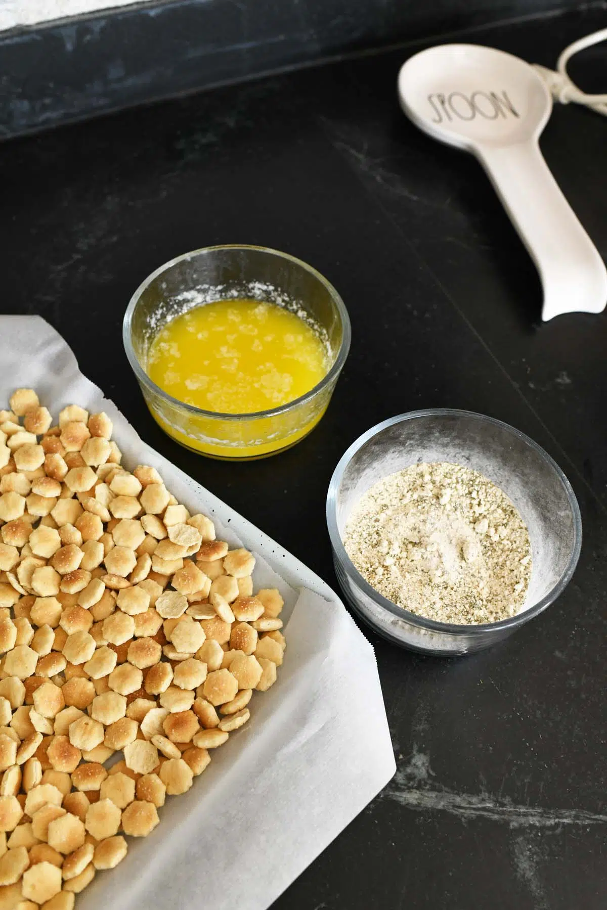 Melted butter and ranch powder with oyster crackers.