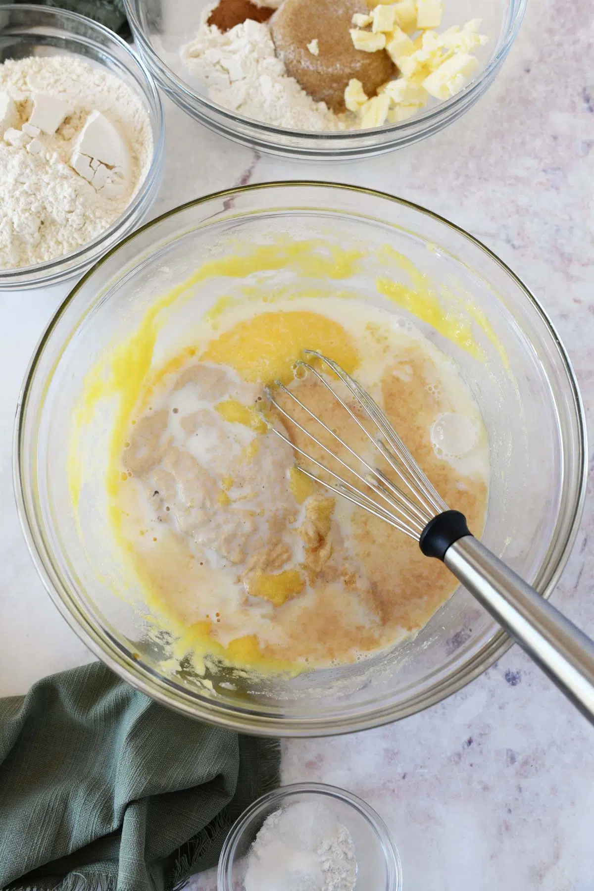 sourdough coffee cake batter in a glass bowl.