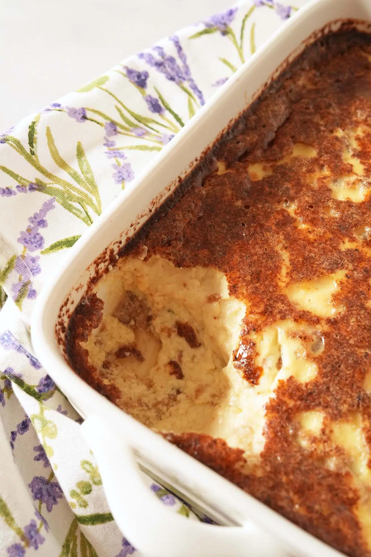 Up close shot of the layers inside a dish of Grape-Nuts Pudding.
