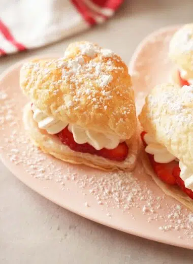 Strawberry Heart crea puffs on a pink, heart plate.