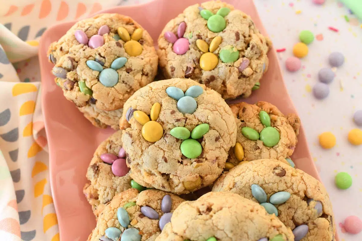 Up close shot of pastel M&M bunnies on a pink plate.