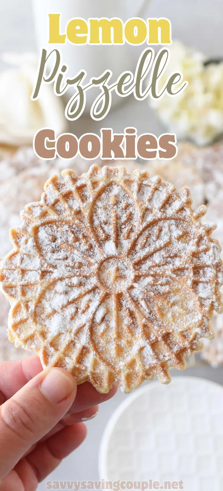 A pinterest pin that reads: Lemon Pizzelle cookies. A hadnholding a powdered pizzelle is featured.